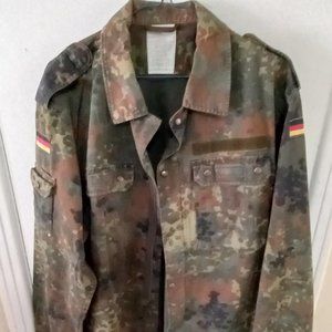 German Army jacket. Size L regular. Camouflaged fabric 35%polyester65%cotton